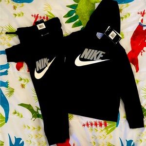 Brand new with tags. Nike sweat shirt and bottoms